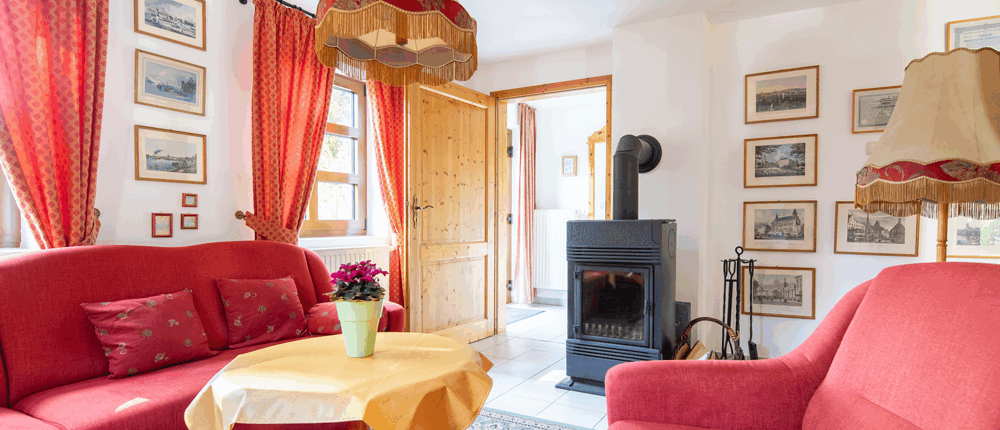 Ferienwohnung-Wohnen-Kaminofen